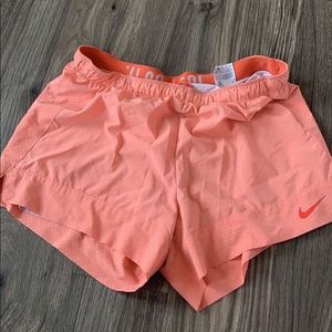 pink Nike shorts